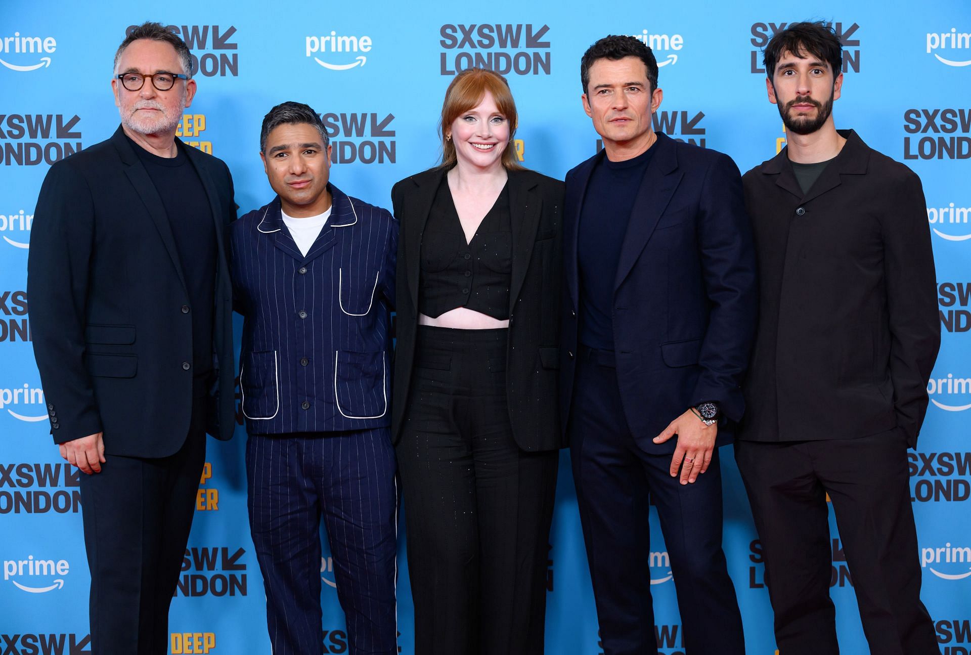 (L-R) Colin Trevorrow, Nick Mohammed, Bryce Dallas Howard, Orlando Bloom, and Tom Kingsley attend the "Deep Cover" World Premiere during SXSW London 2025 at the Barbican Centre on June 04, 2025, in London, England. (Image via Getty)